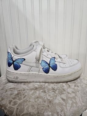 Nike White Leather Sneakers with Blue Butterfly Accent Size 5Y